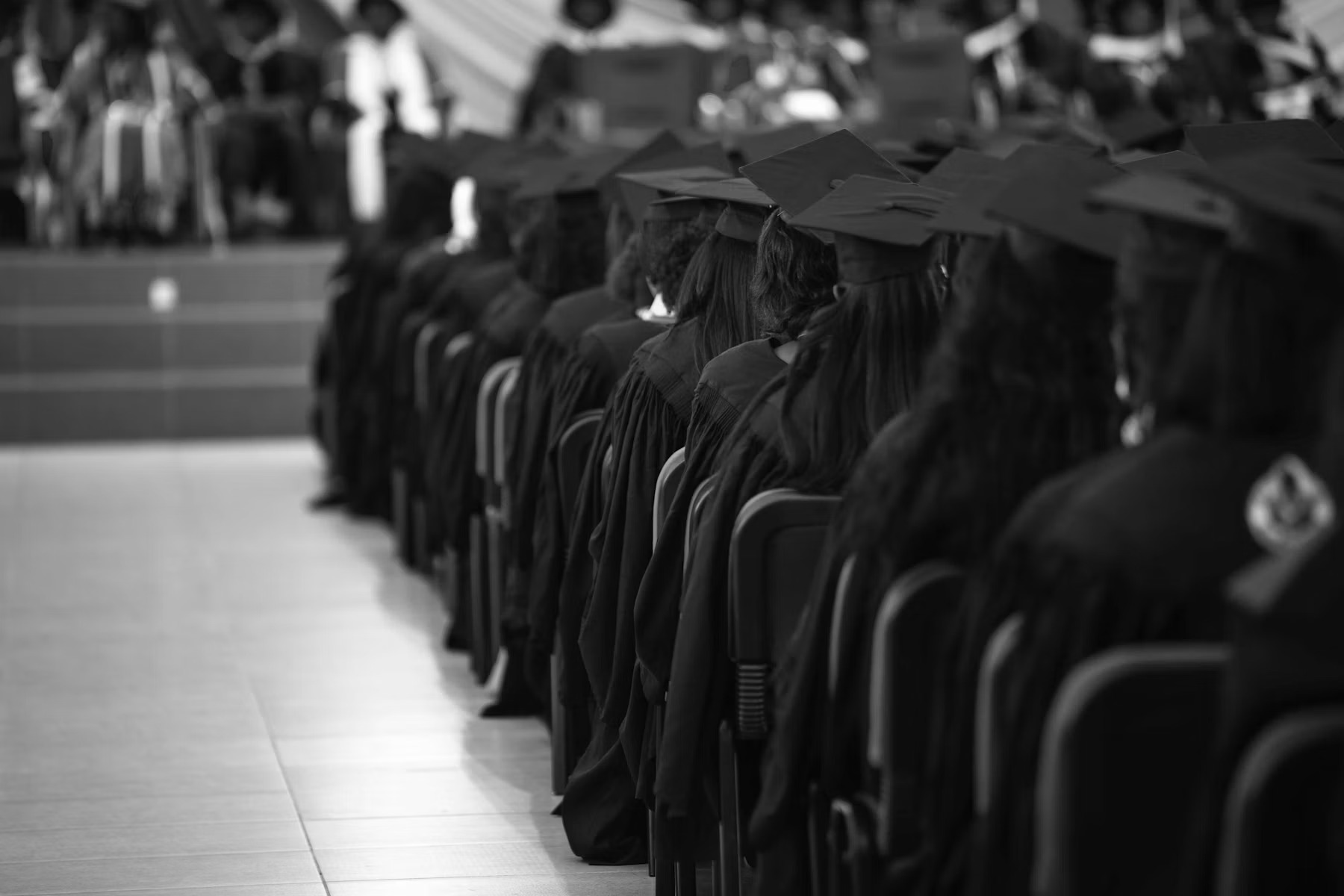Graduates celebrating at a doctoral commencement ceremony